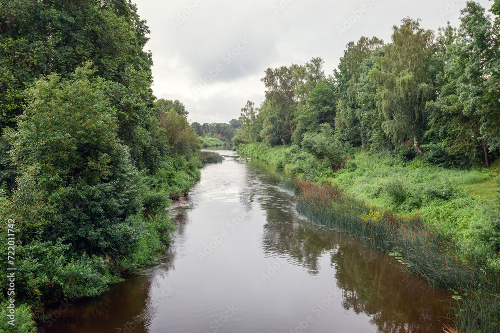 River - Minija Lithuania. View from above from the pedestrian bridge River - Minija Lithuania. View from above from the pedestrian bridge
