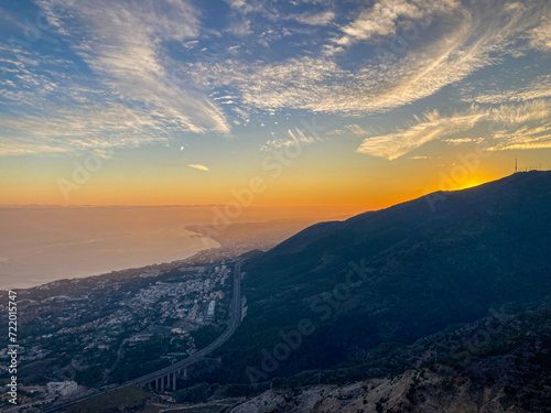 Sunset over Mediterranean sea  and Fuengirola from Calamorro peak, Costa del Sol, Andalusia, Spain photo