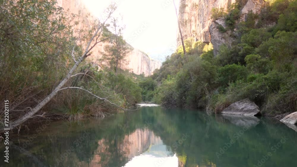 views of the Turia River as it passes through the enormous cliffs of the hanging bridges of Chulilla views of the Turia River as it passes through the enormous cliffs of the hanging bridges of Chulilla