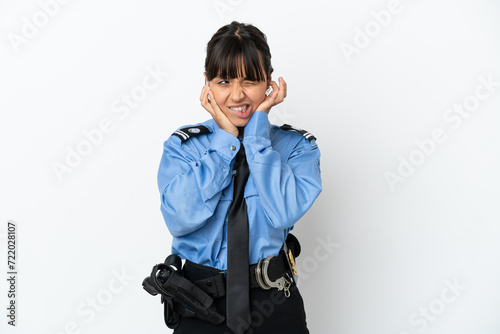 Young police mixed race woman isolated background frustrated and covering ears