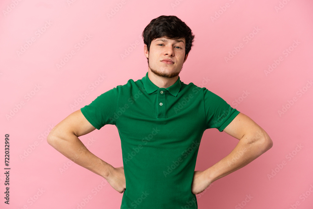 Young Russian man isolated on pink background angry Young Russian man isolated on pink background angry