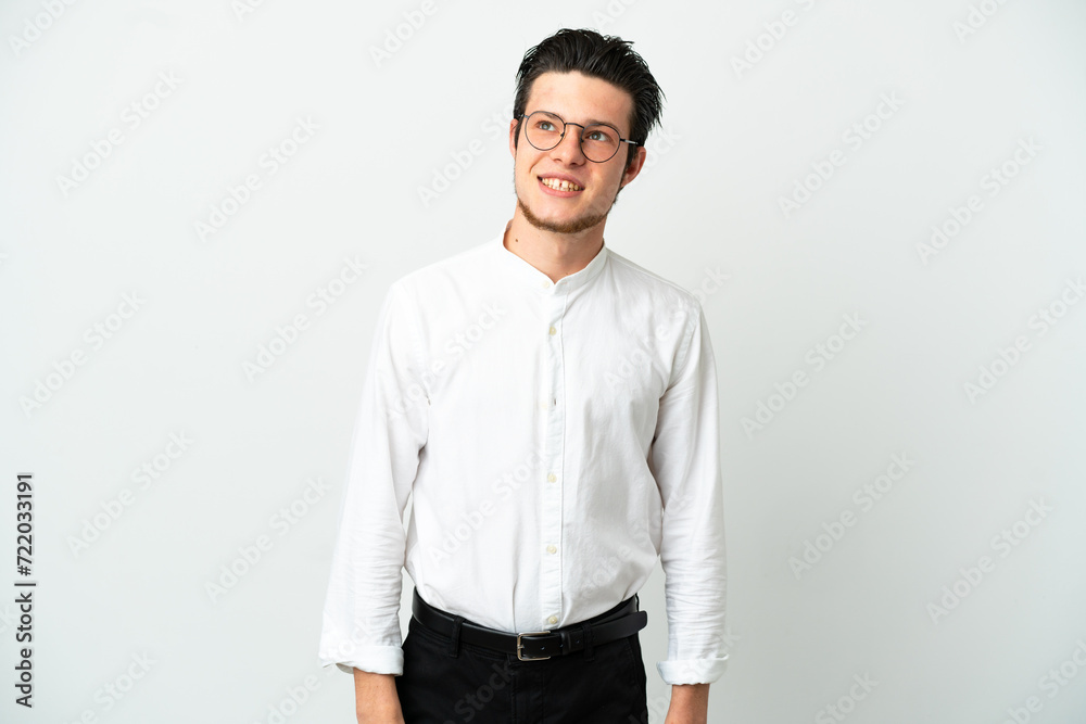 Russian Business man isolated on white background thinking an idea while looking up Russian Business man isolated on white background thinking an idea while looking up