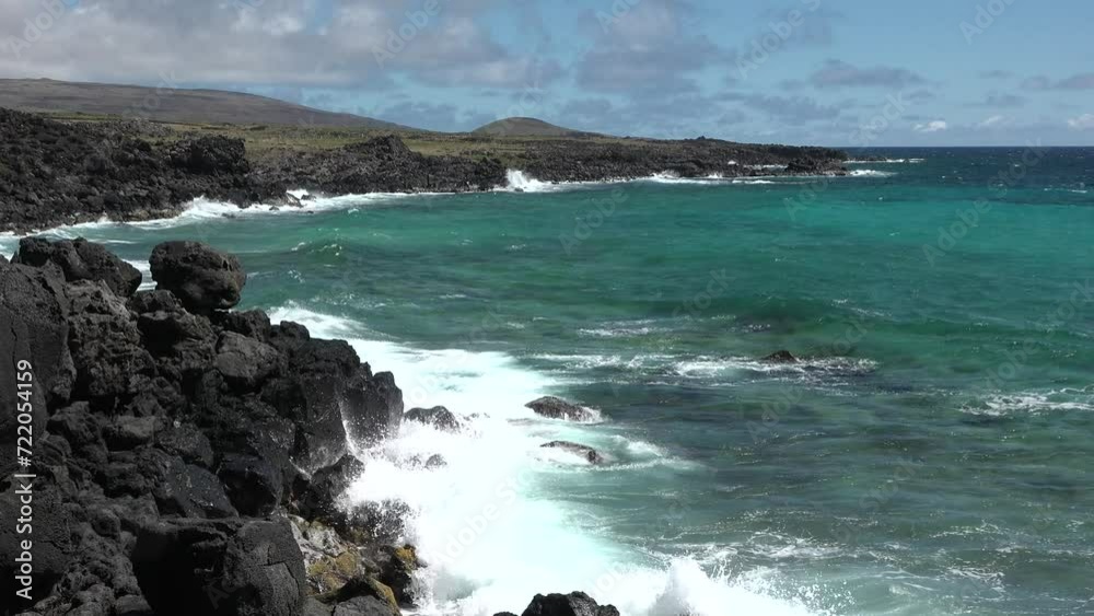 Powerful waves of the Atlantic Ocean. Waves and rocks of the Atlantic Ocean. Beautiful seascape. View of the Atlantic azure ocean and giant waves crashing against a rocky cliff with splashes. Powerful waves of the Atlantic Ocean. Waves and rocks of the Atlantic Ocean. Beautiful seascape. View of the Atlantic azure ocean and giant waves crashing against a rocky cliff with splashes.