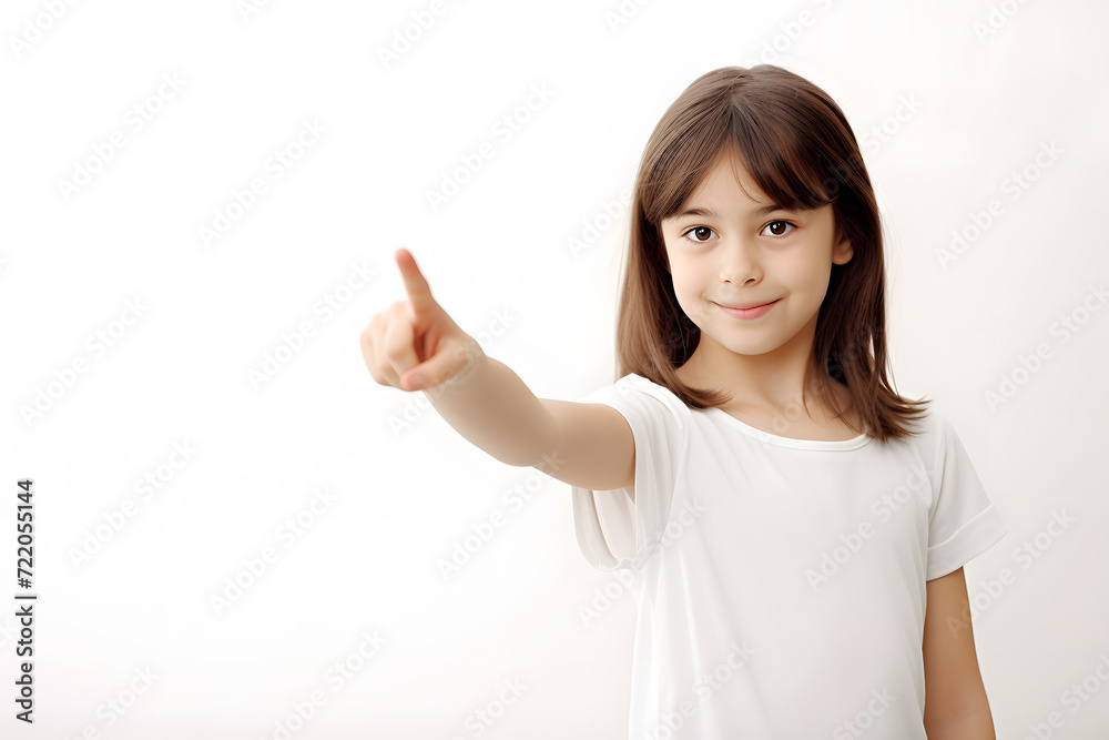 Full-Size Photograph of a Positive and Gorgeous Girl, Indicating with her Finger towards an Empty Space. Exuding Positivity and Charm, Isolated Against a Striking white Background. Full-Size Photograph of a Positive and Gorgeous Girl, Indicating with her Finger towards an Empty Space. Exuding Positivity and Charm, Isolated Against a Striking white Background.