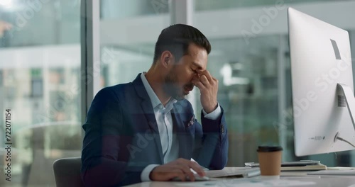 Business man, headache and tired on computer for information technology, online planning and office stress. Worker, programmer or developer with fatigue, pain or frustrated for mistake on desktop photo