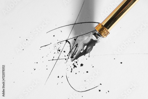 Fototapeta Naklejka Na Ścianę i Meble -  Signing on sheet of paper with fountain pen, closeup