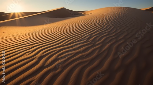 Sun-kissed sand dunes casting long shadows in the late afternoon  showcasing the dynamic play of light and shadow