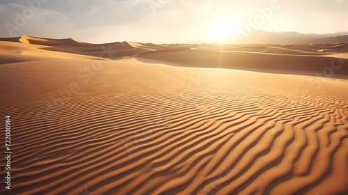 Sun-kissed sand dunes casting long shadows in the late afternoon, showcasing the dynamic play of light and shadow
