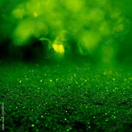 St. Patrick day. Shiny green glitter, closeup. Bokeh effect