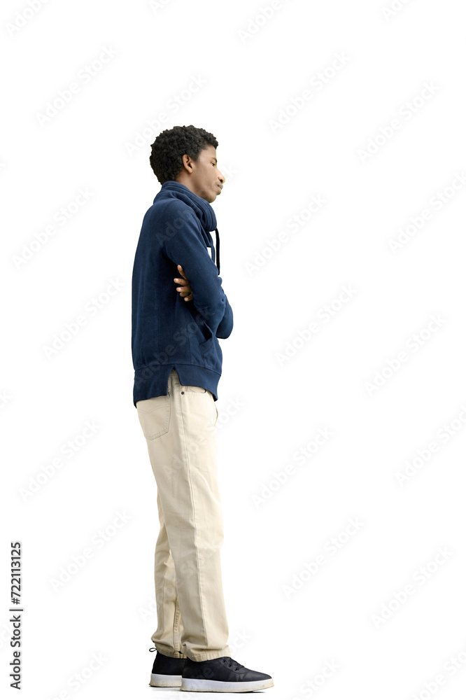 Fototapeta premium A man, full-length, on a white background, crossed his arms