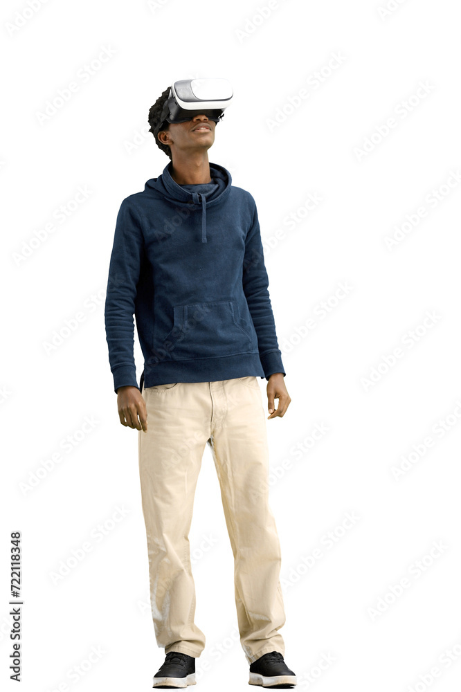 Fototapeta premium Man, full-length, on a white background, wearing VR glasses