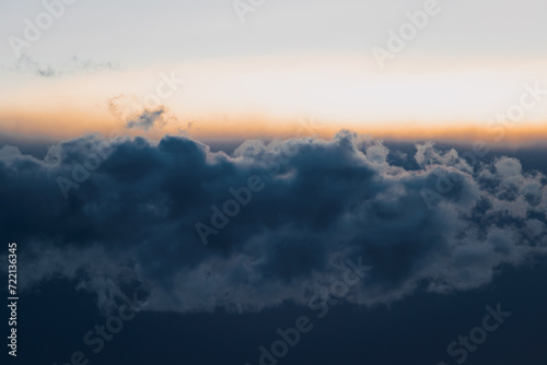 Beautiful blue and orange sky with clouds at twilight © Reflexpixel