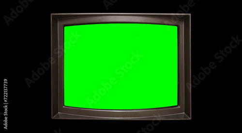 Принти на полотні Retro television with chroma key green screen for designer on black background