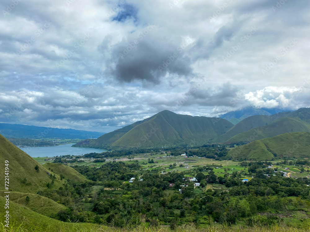 Lake Toba of north Sumatra against cloudy sky taken from Dolok Raja. Lake Toba of north Sumatra against cloudy sky taken from Dolok Raja.