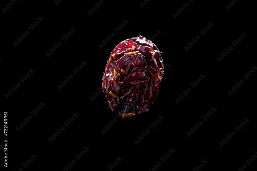 cranberries on a black background cranberries on a black background