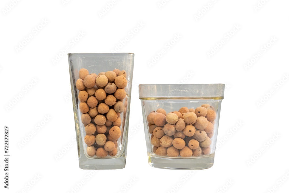 Leca clay balls in transparent vase and pot isolated on white background Leca clay balls in transparent vase and pot isolated on white background