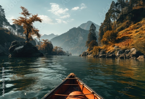 Amidst the tranquil beauty of a lake, a lone canoe glides through the water as the sky and trees watch over its peaceful journey