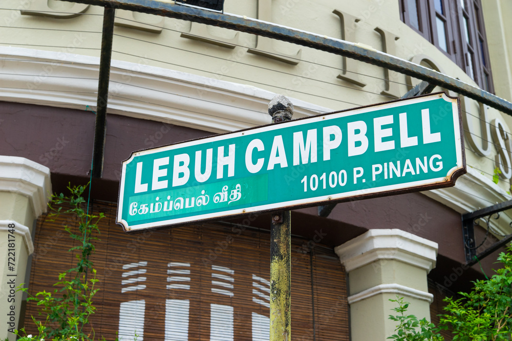 Campbell Street street sign in George Town, Penang, Malaysia with surrounding building as background.
