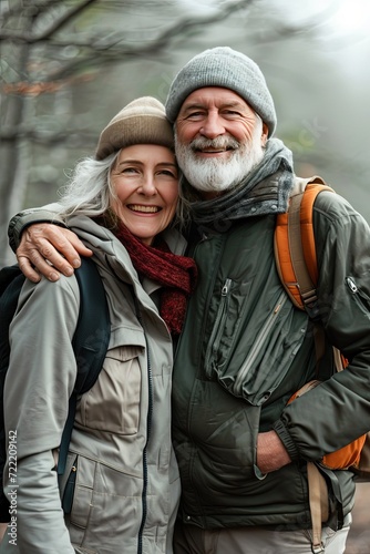 Love and laughter fill the air as this elderly duo takes a leisurely walk, reminding us that happiness knows no bounds. Portrait of an active elderly couple together outdoors. 