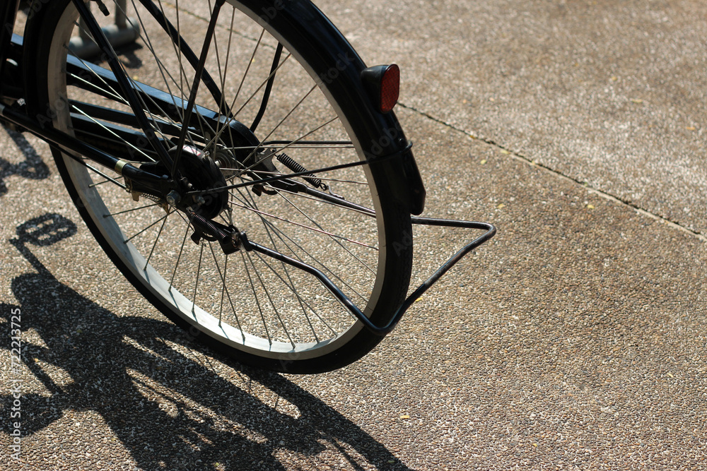 Bicycle in the park at a bicycle rack Bicycle in the park at a bicycle rack