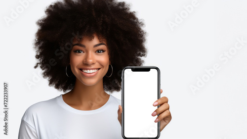 Young Black woman showing a smartphone display with copy space