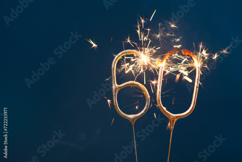 60 years celebration festive background made with Bengal fires in the form of number Sixty. photo