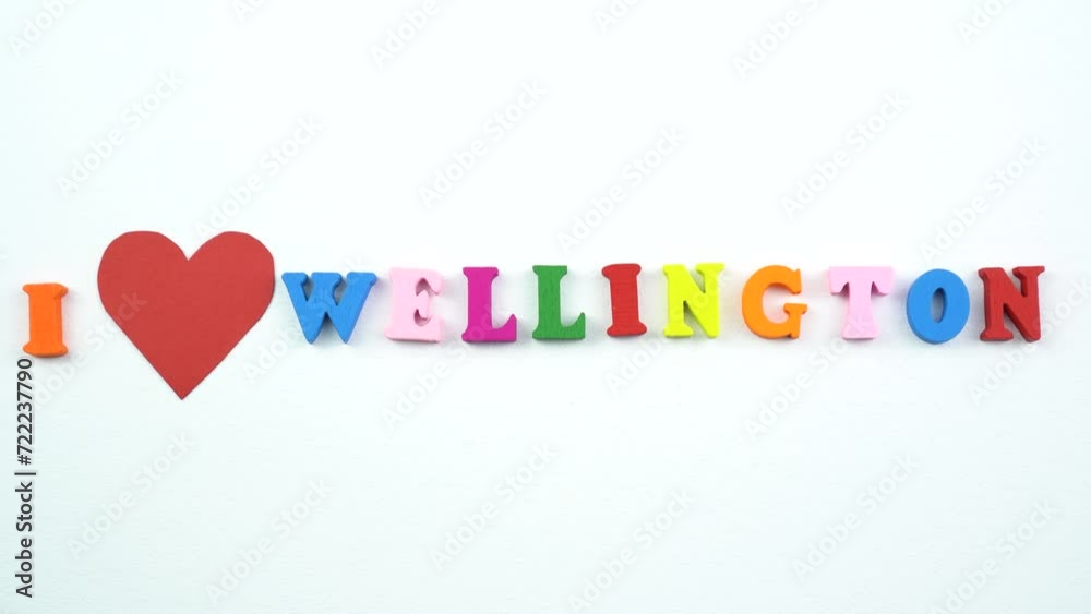 I love Wellington. Text from colorful wooden letters and a beating paper red heart. I love Wellington. Text from colorful wooden letters and a beating paper red heart.
