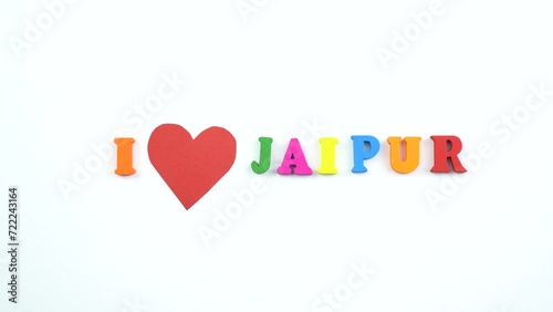 I love Jaipur. Text from colorful wooden letters and a beating paper red heart.