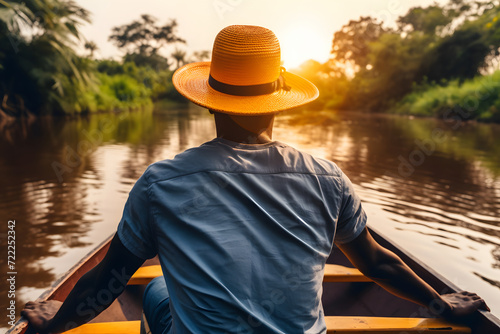Fisherman Standing on boat in sunset