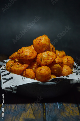 Moring (cimol kering) is a typical Garut snack made from wheat flour and tapioca sprinkled with powdered spices. There are spicy, cheesy and original flavors. photo