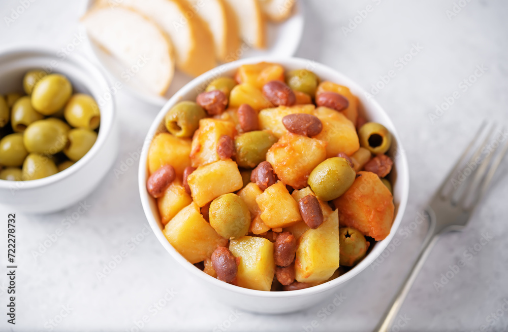 Puerto Rican traditional potato red kidney bean stew in a bowl Puerto Rican traditional potato red kidney bean stew in a bowl