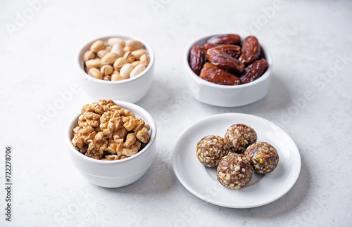 Dates and nuts raw healthy balls in a plate