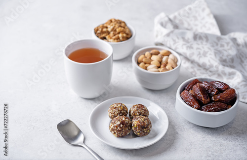 Dates and nuts raw healthy balls in a plate