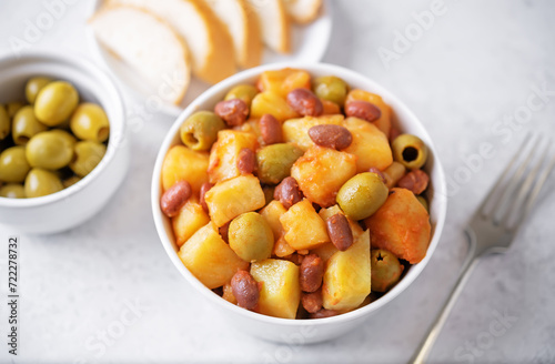 Puerto Rican traditional potato red kidney bean stew in a bowl