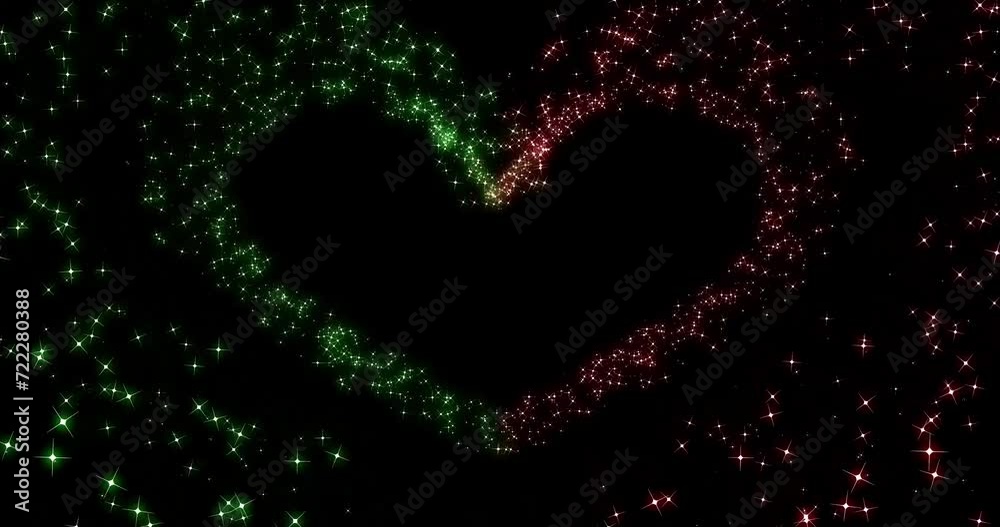 Green and red particles glitter glow heart effect material background (black background) . Loop material, overlays and frames. Green and red particles glitter glow heart effect material background (black background) . Loop material, overlays and frames.