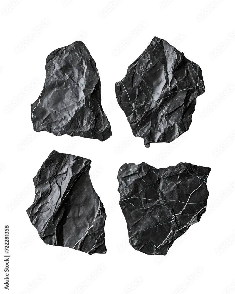 Naklejka premium Four pieces of crumpled up black linoleum