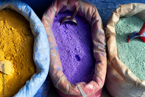 Sacks of colourful powdered pigments © Lucia Tieko