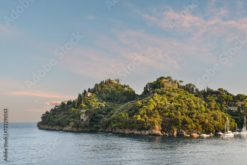 View of the Promontory of Portofino on the Italian Riviera at sunset in summer, Portofino, Genoa, Liguria, Italy