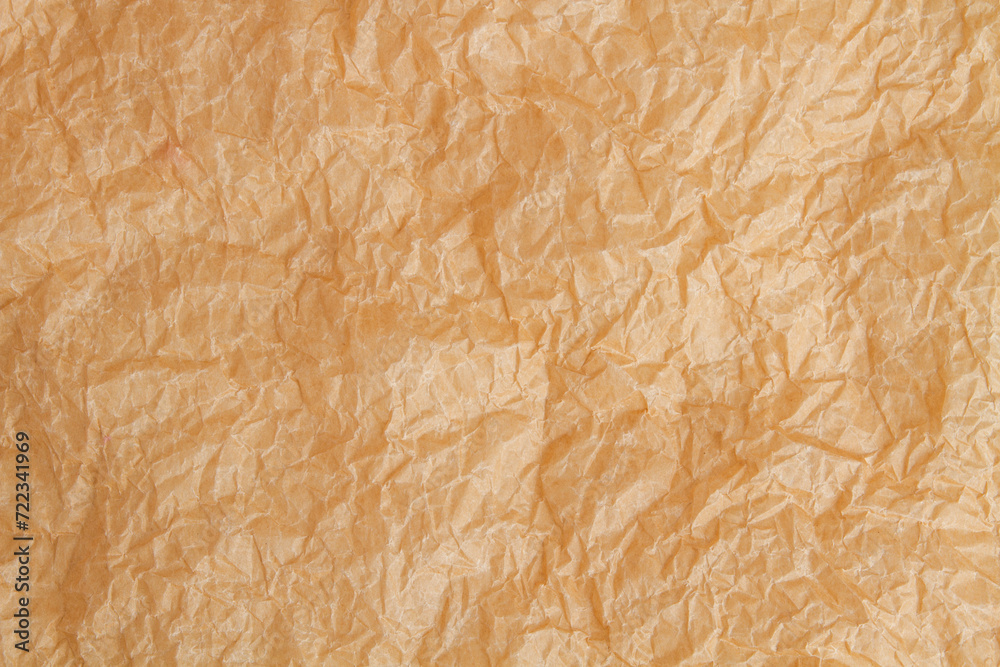 Crumpled yellow craft paper background. Crumpled yellow craft paper background.