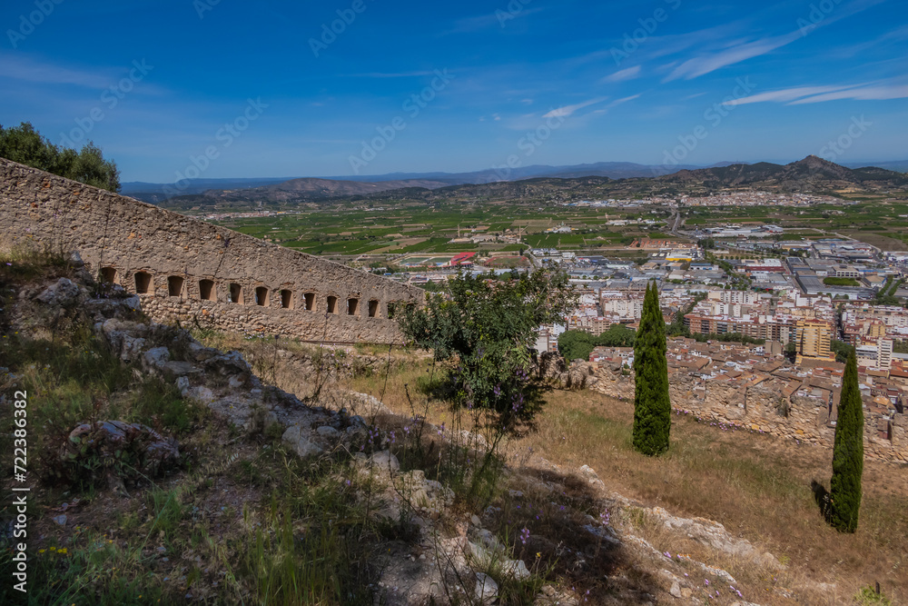 Xativa Castle or Castillo de Xativa - ancient fortification on the ancient roadway Via Augusta in Spain. Medieval ruins of the walls of Xativa castle. Xativa, Spain, Europe. Xativa Castle or Castillo de Xativa - ancient fortification on the ancient roadway Via Augusta in Spain. Medieval ruins of the walls of Xativa castle. Xativa, Spain, Europe.