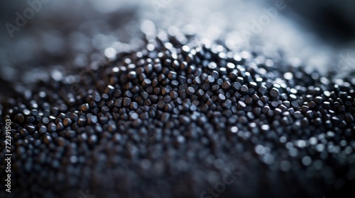 Selective focus macro photograph of abstract background featuring granular activated carbon.