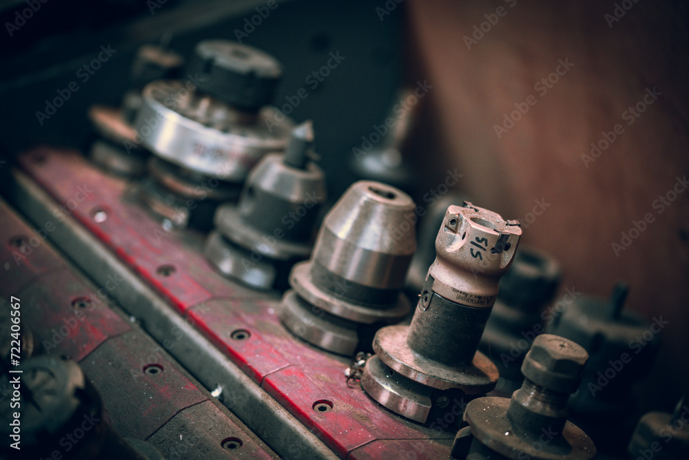 CMC machine spindle tools in a dusty toolbox in a metal workshop CMC machine spindle tools in a dusty toolbox in a metal workshop