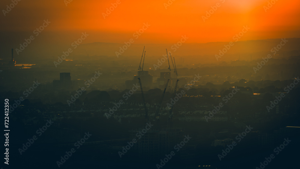 Cranes in the sunset light in Brighton, East Sussex, UK Cranes in the sunset light in Brighton, East Sussex, UK