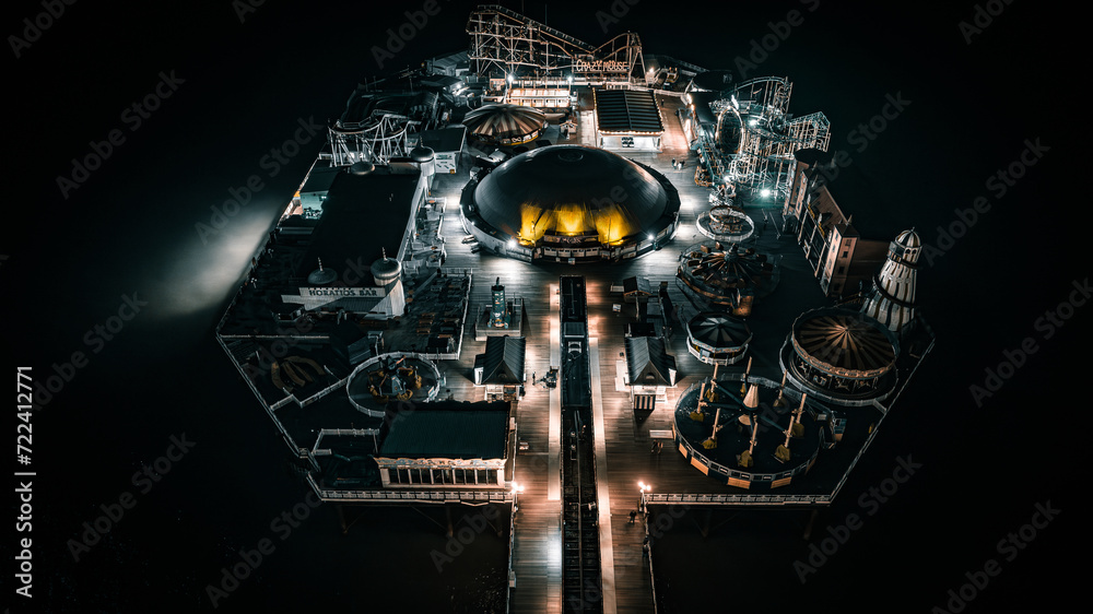 Aerial view of a seaside, Brighton Pier and beach in night lights, Brighton, East Sussex, UK - obrazy, fototapety, plakaty 