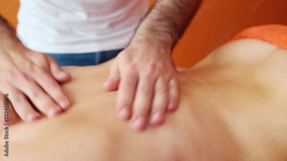 Hairy hands of man do massage in fast circular movements and pinch to woman Hairy hands of man do massage in fast circular movements and pinch to woman
