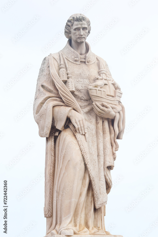 Lisbon, Portugal - December 11, 2023: Statue of St. Vincente (Sao Vicente) at Santa Luzia viewpoint in Alfama district. Lisbon, Portugal - December 11, 2023: Statue of St. Vincente (Sao Vicente) at Santa Luzia viewpoint in Alfama district.