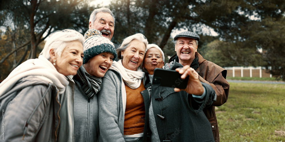 Excited, selfie and group of senior friends in outdoor green environment for fresh air. Diversity, happy and elderly people in retirement taking picture together while exploring and bonding in a park Excited, selfie and group of senior friends in outdoor green environment for fresh air. Diversity, happy and elderly people in retirement taking picture together while exploring and bonding in a park