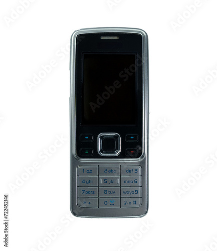 Obraz na płótnie Close-up of an old and obsolete cell phone on a white background. Isolated.10 w salonie