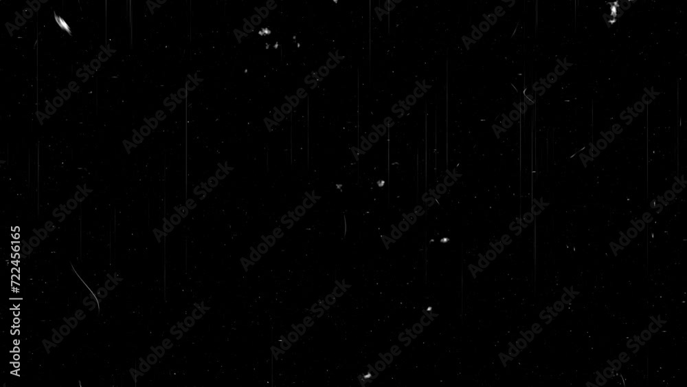 Dust and grain on the old damaged film surf white dust and scratches on a black background. The texture of dirt on the glass 4k free video download