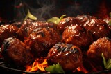 Close up shot of meatballs cooking on a grill. Perfect for BBQ and outdoor cooking themes